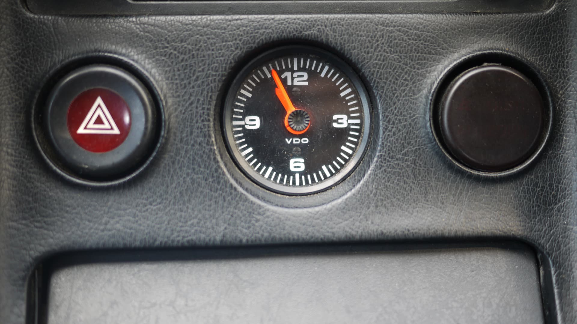 VDO clock and hazard button on the dashboard